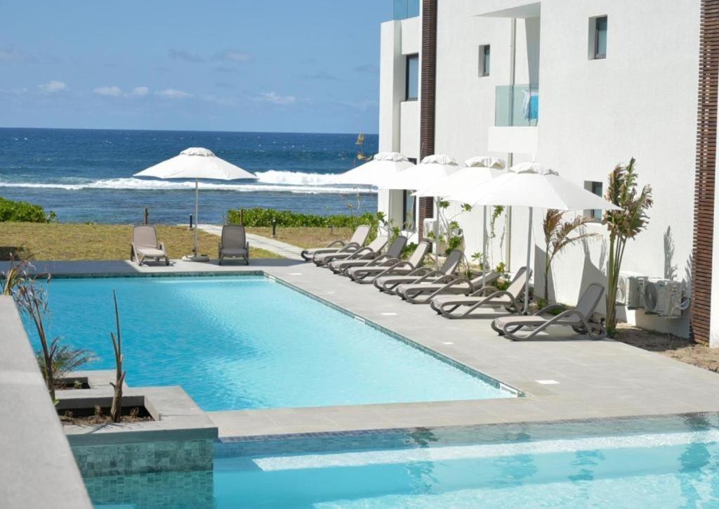 Eastern Blue Beachfront Luxury Apartment Poste Lafayette Екстериор снимка